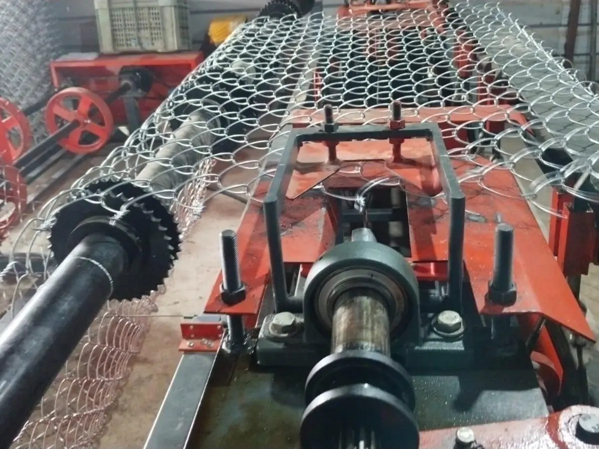 Chain-link mesh coming off the weaving machine